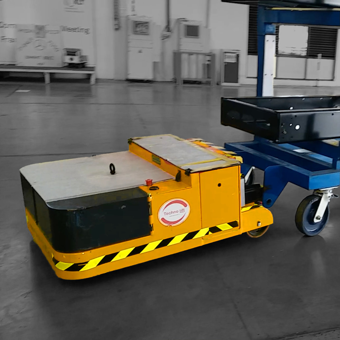 power pusher clamped on to a trolley to push and pull from a location to another location in a industry